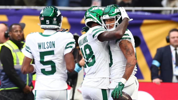 Oct 6, 2024; Tottenham, ENG; New York Jets Wide Receiver Allen Lazard (10) celebrates with Wide Receiver Mike Williams (18) after he scores a touch down for 6-17 in the 2nd Quarter against Minnesota Vikings at Tottenham Hotspur Stadium.