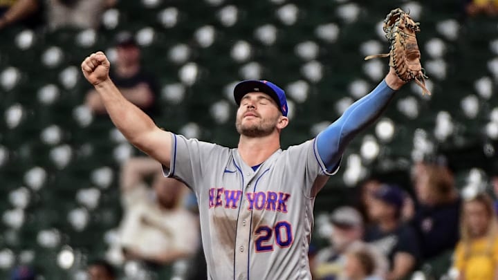 Sep 19, 2022; Milwaukee, Wisconsin, USA; New York Mets first baseman Pete Alonso (20) celebrates after the Mets clinched a playoff spot by beating the Milwaukee Brewers at American Family Field. Mandatory Credit: Benny Sieu-Imagn Images Sep 19, 2022; Milwaukee, Wisconsin, USA; New York Mets first baseman Pete Alonso (20) celebrates after the Mets clinched a playoff spot by beating the Milwaukee Brewers at American Family Field. Mandatory Credit: Benny Sieu-Imagn Images