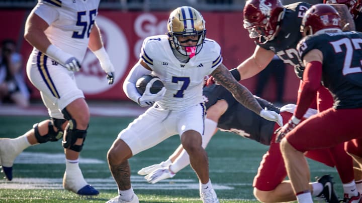 Raiden Vines-Bright looks for running room against Washington State. Raiden Vines-Bright looks for running room against Washington State.