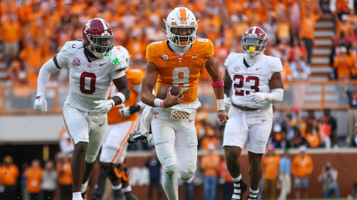 Oct 19, 2024; Knoxville, Tennessee, USA; Tennessee Volunteers quarterback Nico Iamaleava (8) runs the ball against the Alabama Crimson Tide during the second half at Neyland Stadium. Mandatory Credit: Randy Sartin-Imagn Images