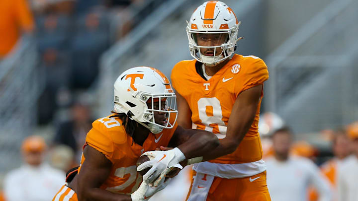 Sep 23, 2023; Knoxville, Tennessee, USA; Tennessee Volunteers quarterback Nico Iamaleava (8) hands the ball off to running back Khalifa Keith (20) during the second half against the UTSA Roadrunners at Neyland Stadium. Mandatory Credit: Randy Sartin-Imagn Images Sep 23, 2023; Knoxville, Tennessee, USA; Tennessee Volunteers quarterback Nico Iamaleava (8) hands the ball off to running back Khalifa Keith (20) during the second half against the UTSA Roadrunners at Neyland Stadium. Mandatory Credit: Randy Sartin-Imagn Images