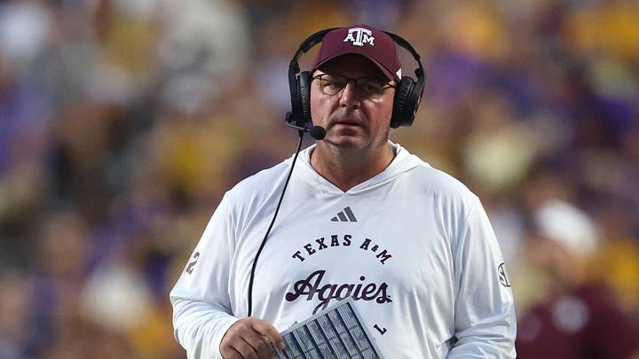 Sep 26, 2026; Baton Rouge, Louisiana, USA; Texas A&M Aggies head coach Mike Elko walks on the field during a time-out during the first quarter against the LSU Tigers xat Tiger Stadium. Mandatory Credit: Stephen Lew-Imagn Images Sep 26, 2026; Baton Rouge, Louisiana, USA; Texas A&M Aggies head coach Mike Elko walks on the field during a time-out during the first quarter against the LSU Tigers xat Tiger Stadium. Mandatory Credit: Stephen Lew-Imagn Images