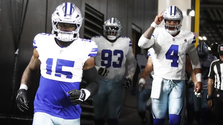 Oct 6, 2024; Pittsburgh, Pennsylvania, USA;  Dallas Cowboys running back Ezekiel Elliott (15) and quarterback Dak Prescott (4) take the field to play the Pittsburgh Steelers.