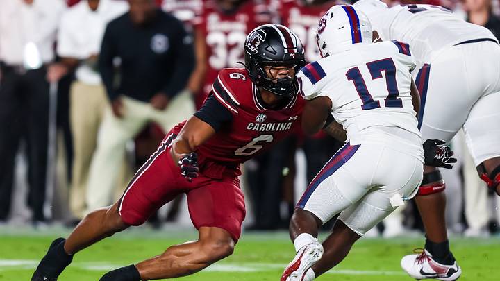 Sep 6, 2025; Columbia, South Carolina, USA; South Carolina Gamecocks linebacker Dylan Stewart (6) brings down South Carolina State Bulldogs running back KZ Adams (17) in the first quarter at Williams-Brice Stadium. Mandatory Credit: Jeff Blake-Imagn Images Sep 6, 2025; Columbia, South Carolina, USA; South Carolina Gamecocks linebacker Dylan Stewart (6) brings down South Carolina State Bulldogs running back KZ Adams (17) in the first quarter at Williams-Brice Stadium. Mandatory Credit: Jeff Blake-Imagn Images
