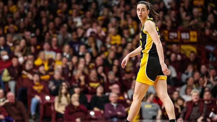 Feb 28, 2024; Minneapolis, Minnesota, USA; Iowa Hawkeyes guard Caitlin Clark (22) looks on during the Hawkeyes game against Minnesota.