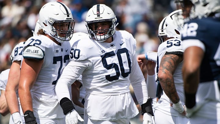 Penn State offensive linemen Nolan Rucci (72) and Cooper Cousins (50)