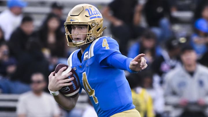 Nov 30, 2024; Pasadena, California, USA; UCLA Bruins quarterback Ethan Garbers (4) scrambles out of the pocket against the Fresno State Bulldogs during the fourth quarter at Rose Bowl. Mandatory Credit: Robert Hanashiro-Imagn Images
