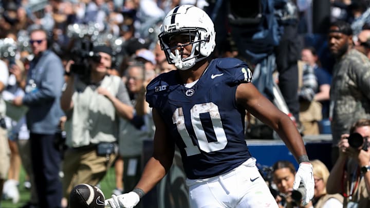 Penn State running back Nicholas Singleton runs into the end zone for a touchdown during the third quarter against the Bowling Green Falcons at Beaver Stadium. Penn State running back Nicholas Singleton runs into the end zone for a touchdown during the third quarter against the Bowling Green Falcons at Beaver Stadium.