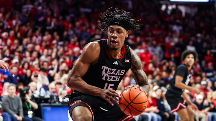 Feb 14, 2026; Tucson, Arizona, USA; Texas Tech Red Raiders forward JT Toppin (15) dribbles and dunks the ball during the first half of the game against the Arizona Wildcats at McKale Memorial Center. Mandatory Credit: Aryanna Frank-Imagn Images Feb 14, 2026; Tucson, Arizona, USA; Texas Tech Red Raiders forward JT Toppin (15) dribbles and dunks the ball during the first half of the game against the Arizona Wildcats at McKale Memorial Center. Mandatory Credit: Aryanna Frank-Imagn Images