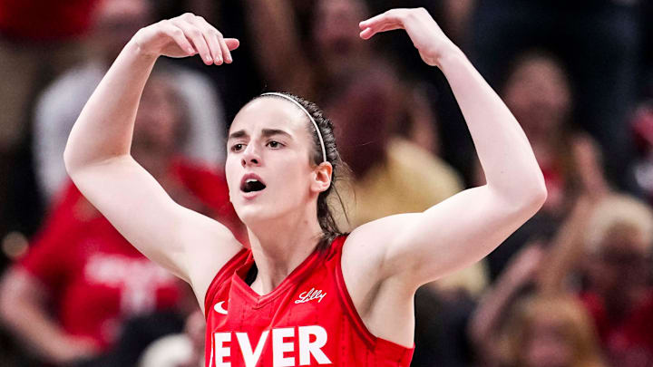 Indiana Fever guard Caitlin Clark (22) gets the crowd excited 