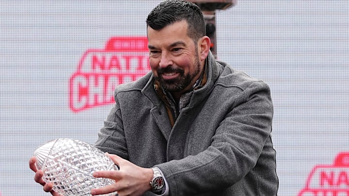 Ohio State Buckeyes head coach Ryan Day holds the Coaches' Trophy during the Ohio State Buckeyes College Football Playoff National Championship celebration at Ohio Stadium in Columbus on Jan. 26, 2025.