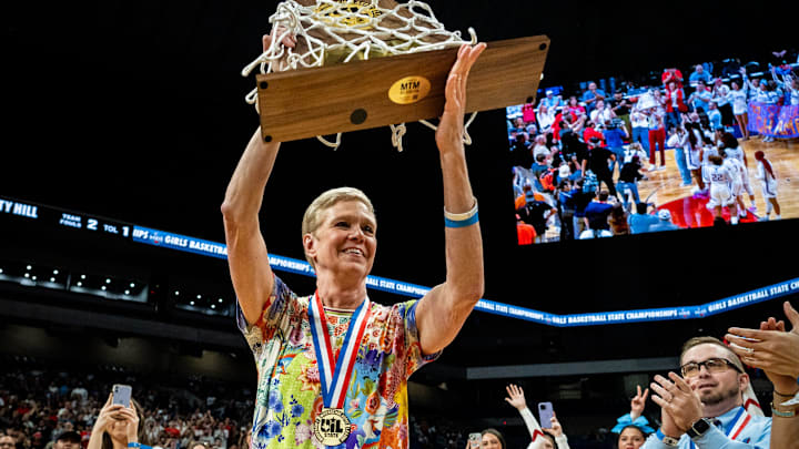 Lubbock Monterey Head Coach Jill Schneider celebrates the team's 64-35 Texas UIL 5A Division 2 State Championship victory over Liberty Hill at The Alamodome in San Antonio, March 1, 2025.