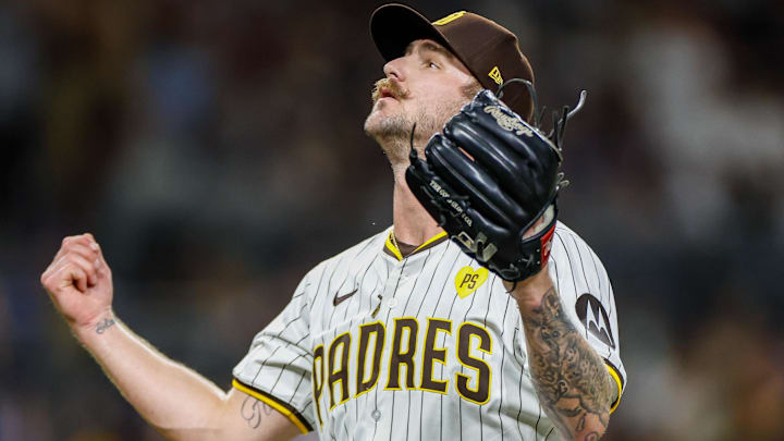 Jul 30, 2024; San Diego, California, USA; San Diego Padres relief pitcher Logan Gillaspie (71) celebrates after retiring the side during the eighth inning against the Los Angeles Dodgers at Petco Park. Mandatory Credit: David Frerker-Imagn Images