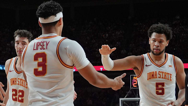 Iowa State Cyclones guard Tamin Lipsey (3)celebrates with Iforward Joshua Jefferson (5) and forward Milan Momcilovic (22) after a three-point play during the second half on Jan. 2, 2026, at Hilton Coliseum in Ames, Iowa.