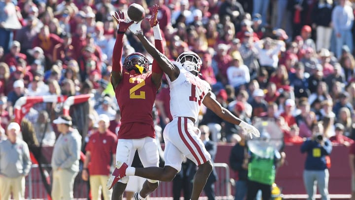 Iowa State Cyclones defensive back T.J. Tampa (2) knocks out the ball from from Oklahoma Sooners wide receiver Marvin Mims Jr. (17) during the third quarter in the Big 12 Conference game. Iowa State Cyclones defensive back T.J. Tampa (2) knocks out the ball from from Oklahoma Sooners wide receiver Marvin Mims Jr. (17) during the third quarter in the Big 12 Conference game.