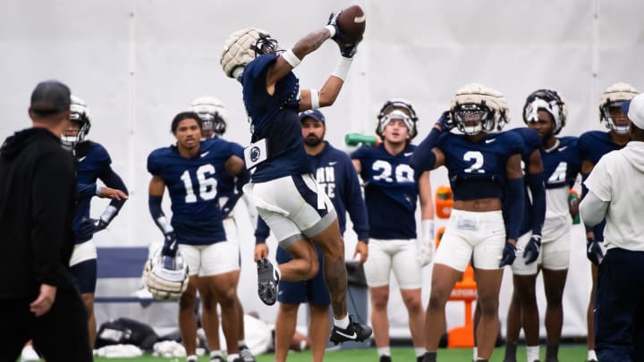 Penn State cornerback A.J. Harris catches a pass during a practice session inside Holuba Hall. Penn State cornerback A.J. Harris catches a pass during a practice session inside Holuba Hall.