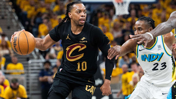 May 9, 2025; Indianapolis, Indiana, USA; Cleveland Cavaliers guard Darius Garland (10) dribbles the ball while Indiana Pacers forward Aaron Nesmith (23) defends during game three of the second round for the 2025 NBA Playoffs at Gainbridge Fieldhouse. Mandatory Credit: Trevor Ruszkowski-Imagn Images May 9, 2025; Indianapolis, Indiana, USA; Cleveland Cavaliers guard Darius Garland (10) dribbles the ball while Indiana Pacers forward Aaron Nesmith (23) defends during game three of the second round for the 2025 NBA Playoffs at Gainbridge Fieldhouse. Mandatory Credit: Trevor Ruszkowski-Imagn Images