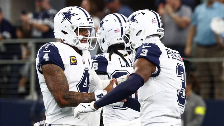 Dallas Cowboys quarterback Dak Prescott and receiver George Pickens celebrate a touchdown against the Washington Commanders Dallas Cowboys quarterback Dak Prescott and receiver George Pickens celebrate a touchdown against the Washington Commanders