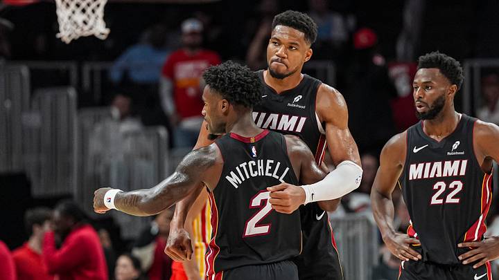 Oct 28, 2026; Atlanta, Georgia, USA; Miami Heat forward Giannis Antetokounmpo (7) and guard Davion Mitchell (2) react at the end of the game against the Atlanta Hawks at State Farm Arena. Mandatory Credit: Dale Zanine-Imagn Images