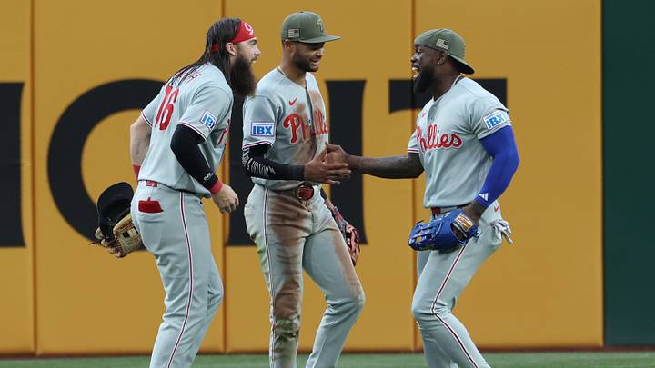 May 16, 2026; Pittsburgh, Pennsylvania, USA;  Philadelphia Phillies left fielder Brandon Marsh (16) and center fielder Justin Crawford (middle) and right fielder Adolis García (right) celebrate in the outfield after defeating the Pittsburgh Pirates at PNC Park. Mandatory Credit: Charles LeClaire-Imagn Images