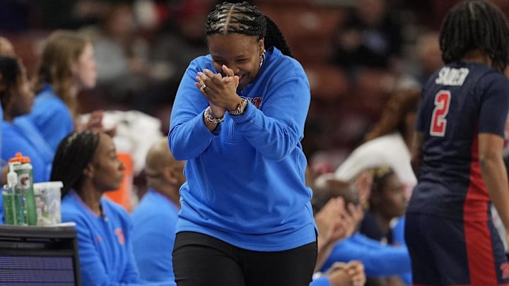 Mar 7, 2025; Greenville, SC, USA; Ole Miss Rebels head coach Yolett McPhee-McCuin reacts to closing the scoring gap against Texas Longhorns during the second half at Bon Secours Wellness Arena. Mandatory Credit: Jim Dedmon-Imagn Images