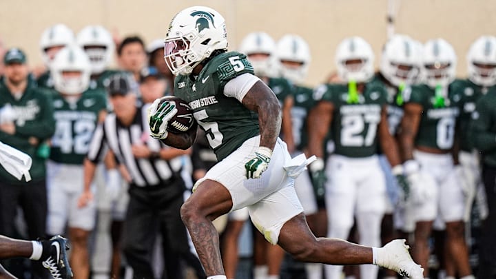 Michigan State running back Makhi Frazier (5) runs for first down against Western Michigan during the first half at Spartan Stadium in East Lansing on Friday, August 29, 2025.