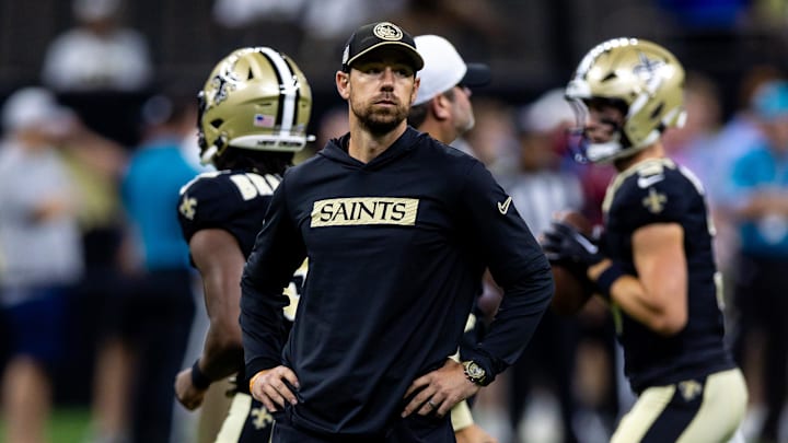 Aug 25, 2024; New Orleans, Louisiana, USA;  New Orleans Saints offensive coordinator Klint Kubiak during the warmups before the game against the Tennessee Titans at Caesars Superdome. Mandatory Credit: Stephen Lew-Imagn Images