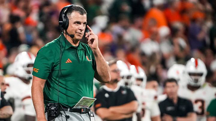 Miami Hurricanes Head Coach Mario Cristobal communicates with players in the game with Clemson during the second quarter at Memorial Stadium Saturday, October 3, 2026.