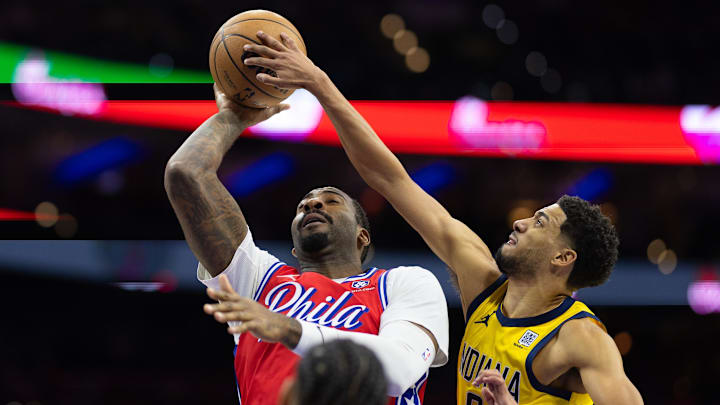 Dec 13, 2024; Philadelphia, Pennsylvania, USA; Indiana Pacers guard Tyrese Haliburton (0) blocks the shot of Philadelphia 76ers center Andre Drummond (5) during the third quarter at Wells Fargo Center. Mandatory Credit: Bill Streicher-Imagn Images