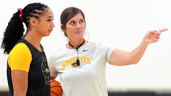 Iowa forward Hannah Stuelke talks to assistant coach Randi Henderson during a women’s basketball practice July 22, 2025 at Carver-Hawkeye Arena in Iowa City, Iowa.