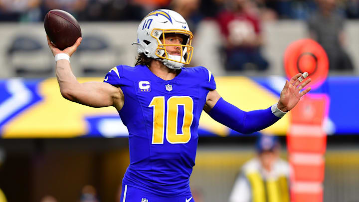 Dec 10, 2023; Inglewood, California, USA; Los Angeles Chargers quarterback Justin Herbert (10) throws against the Denver Broncos during the first half at SoFi Stadium. Mandatory Credit: Gary A. Vasquez-USA TODAY Sports