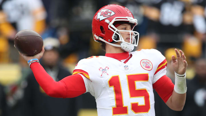 Dec 25, 2024; Pittsburgh, Pennsylvania, USA;  Kansas City Chiefs quarterback Patrick Mahomes (15) passes against the Pittsburgh Steelers during the second quarter at Acrisure Stadium. Mandatory Credit: Charles LeClaire-Imagn Images