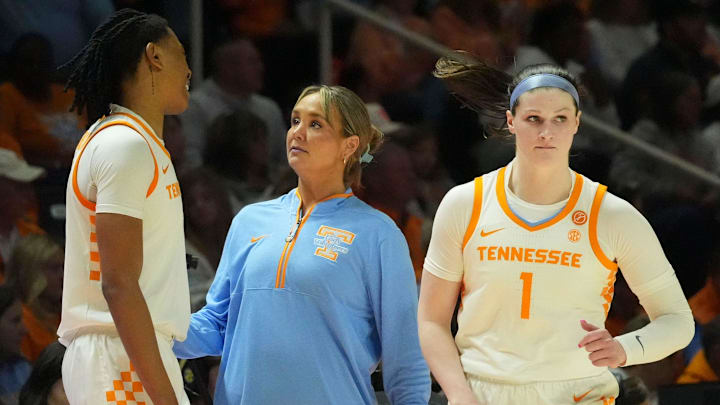 Tennessee basketball coach Kim Caldwell talks with Zee Spearman (11) as she and Sara Puckett (1) sub out during an NCAA college basketball game against Georgia on Sunday, March 2, 2025, in Knoxville, Tenn. Tennessee basketball coach Kim Caldwell talks with Zee Spearman (11) as she and Sara Puckett (1) sub out during an NCAA college basketball game against Georgia on Sunday, March 2, 2025, in Knoxville, Tenn.