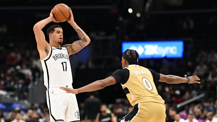 Nov 16, 2025; Washington, District of Columbia, USA;  Brooklyn Nets forward Michael Porter Jr. (17) looks to pass over Washington Wizards guard Bilal Coulibaly (0) during the first quarter at Capital One Arena. Mandatory Credit: Rafael Suanes-Imagn Images