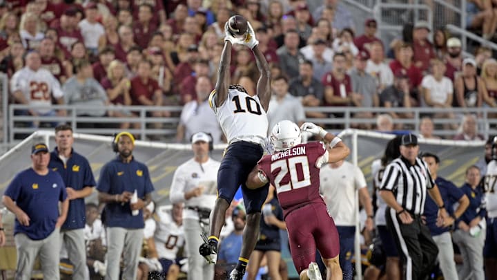 Cal tight end Corey Dyches (10) makes a leaping catch agains Florida State