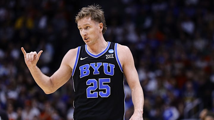 Mar 22, 2025; Denver, CO, USA; Brigham Young Cougars guard Dawson Baker (25) reacts against the Wisconsin Badgers during the second half in the second round of the NCAA Tournament  at Ball Arena. Mandatory Credit: Isaiah J. Downing-Imagn Images