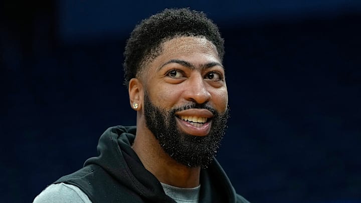 Mavericks forward Anthony Davis reacts on the bench during game against the Warriors. 