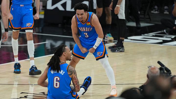 Thunder guard Jared McCain reacts with forward Jaylin Williams during Game 3 of the Western Conference finals.