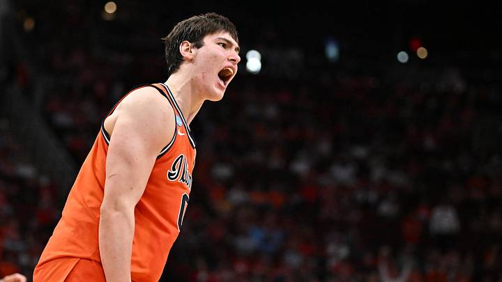 Mar 26, 2026; Houston, TX, USA; Illinois Fighting Illini forward David Mirkovic (0) reacts against the Houston Cougars in the second half during a Sweet Sixteen game of the South Regional of the men's 2026 NCAA Tournament at Toyota Center. Mandatory Credit: Maria Lysaker-Imagn Images Mar 26, 2026; Houston, TX, USA; Illinois Fighting Illini forward David Mirkovic (0) reacts against the Houston Cougars in the second half during a Sweet Sixteen game of the South Regional of the men's 2026 NCAA Tournament at Toyota Center. Mandatory Credit: Maria Lysaker-Imagn Images