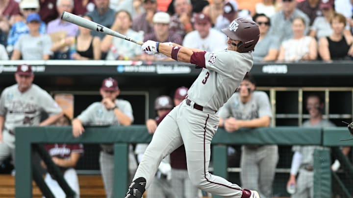 Jun 22, 2024; Omaha, NE, USA;  Texas A&M Aggies second baseman Kaeden Kent (3) drives in two runs with a single against the Tennessee Volunteers during the third inning at Charles Schwab Field Omaha. Mandatory Credit: Steven Branscombe-Imagn Images