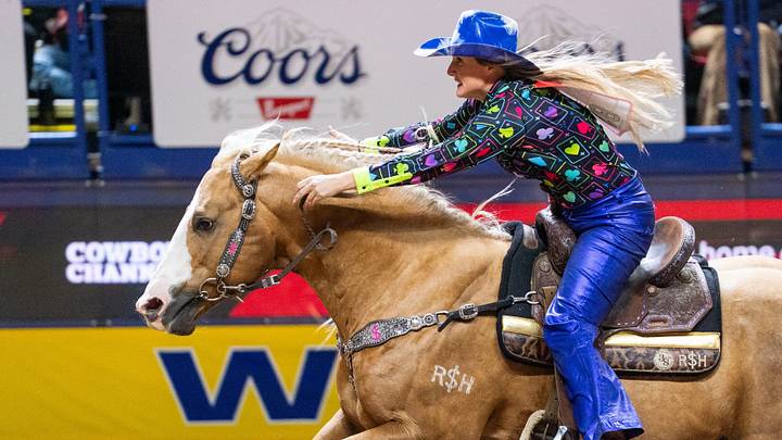 Tricia Aldridge riding Adios out the gate. Tricia Aldridge riding Adios out the gate.