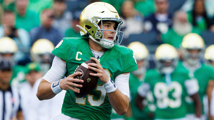 Notre Dame quarterback Riley Leonard looks for an open receiver during a NCAA college football game between Notre Dame and Louisville at Notre Dame Stadium on Saturday, Sept. 28, 2024, in South Bend.