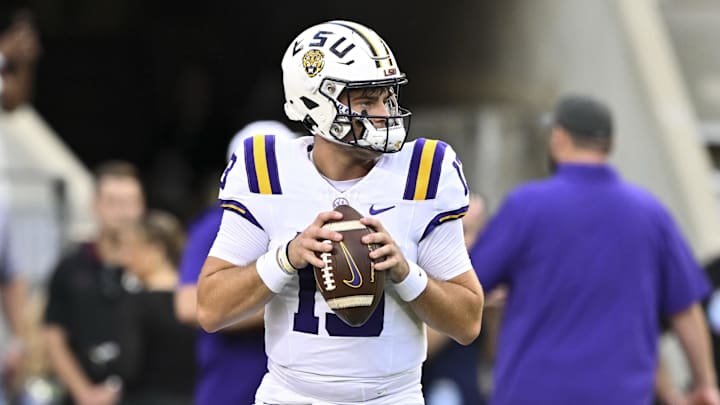 Oct 26, 2024; College Station, Texas, USA; LSU Tigers quarterback Garrett Nussmeier (13) warms up prior to the game against the Texas A&M Aggies The Aggies defeated the Tigers 38-23; at Kyle Field. Mandatory Credit: Maria Lysaker-Imagn Images.
