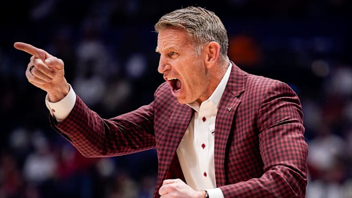 Alabama coach Nate Oats works with his team during the second half of a SEC tournament quarterfinal game against Mississippi at Bridgestone Arena in Nashville, Tenn., Friday, March 13, 2026. Alabama coach Nate Oats works with his team during the second half of a SEC tournament quarterfinal game against Mississippi at Bridgestone Arena in Nashville, Tenn., Friday, March 13, 2026.