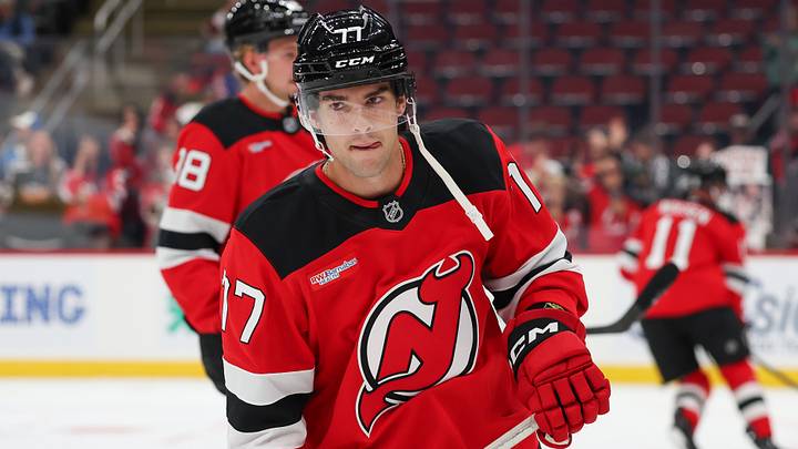 Luke Evangelista skates during warmups with the New Jersey Devils