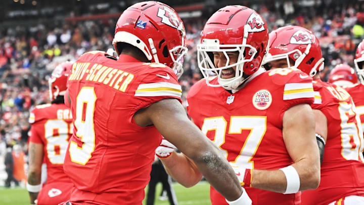 Dec 15, 2024; Cleveland, Ohio, USA; Kansas City Chiefs wide receiver JuJu Smith-Schuster (9) celebrates with tight end Travis Kelce (87) after scoring a touchdown during the first quarter against the Cleveland Browns at Huntington Bank Field. Mandatory Credit: Ken Blaze-Imagn Images
