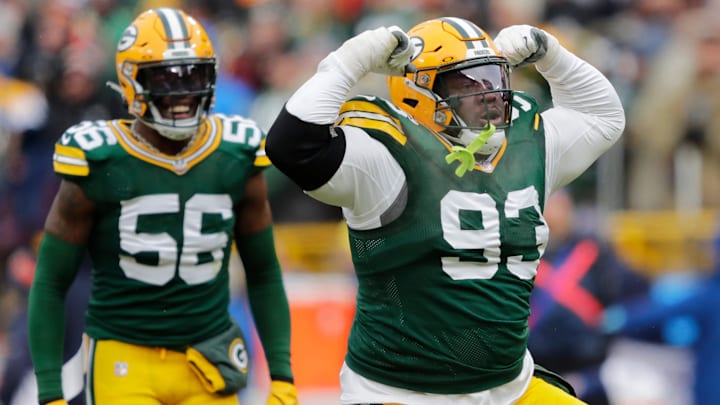 Green Bay Packers defensive tackle T.J. Slaton (93) celebrates making a tackle in the first quarter against the Chicago Bears during their football game Sunday, January 5, 2025, at Lambeau Field in Green Bay, Wisconsin. Green Bay Packers defensive tackle T.J. Slaton (93) celebrates making a tackle in the first quarter against the Chicago Bears during their football game Sunday, January 5, 2025, at Lambeau Field in Green Bay, Wisconsin.