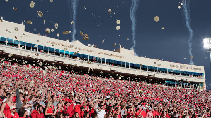 Aug 30, 2025; Lubbock, Texas, USA;  The Texas Tech Red Raiders student body throw tortillas at the kickoff of the game against the Arkansas-Pine Bluff Golden Lions at Jones AT&T Stadium. Mandatory Credit: Michael C. Johnson-Imagn Images