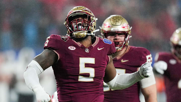 Dec 2, 2023; Charlotte, NC, USA; Florida State Seminoles defensive lineman Jared Verse (5) reacts
