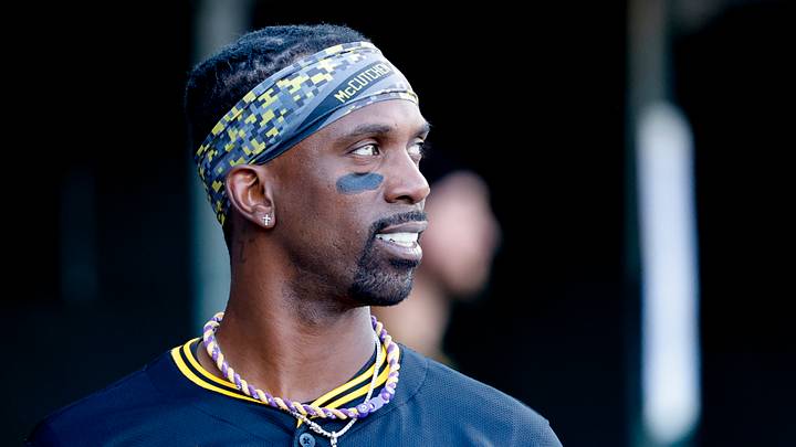 Jun 19, 2025; Detroit, Michigan, USA;  Pittsburgh Pirates designated hitter Andrew McCutchen (22) in the dugout in the sixth inning against the Detroit Tigers at Comerica Park. Mandatory Credit: Rick Osentoski-Imagn Images